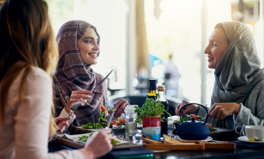 A group of women eating together