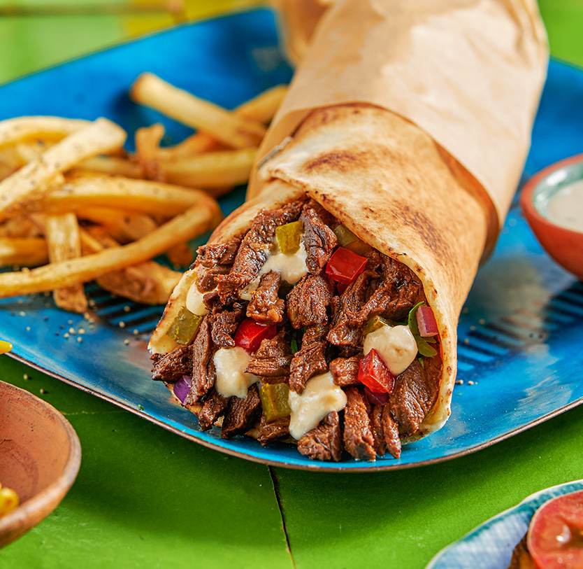 Sliced beef on butcher paper