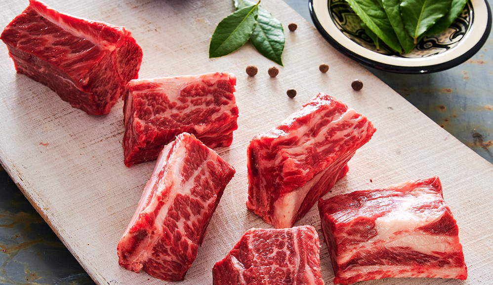 Tri tip steak on a wood cutting board