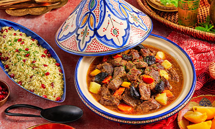 Prepared short ribs with greens and rice